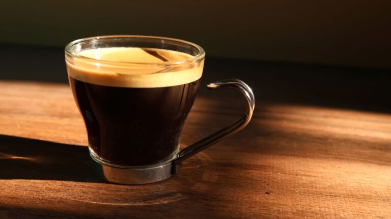 Enjoy a perfectly brewed espresso in a cozy café atmosphere, capturing the warmth and essence of coffee culture.